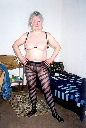 old granny in pantyhose poses